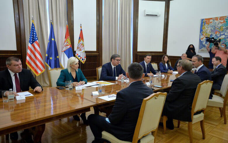 Members of the Serbian Energy Ministry at a conference table